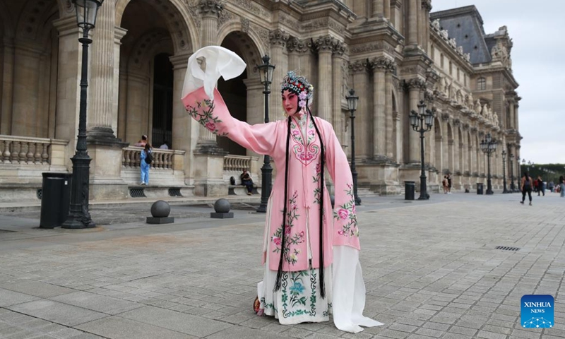 Kunqu Opera actress Kong Aiping stages a flash mob performance near the Louvre Museum in Paris, France, Sept. 13, 2023. Artists from east China's Jiangsu Province presented the charm of Kunqu Opera through a series of flash mob performances near the iconic landmarks in Paris. (Photo: Xinhua)