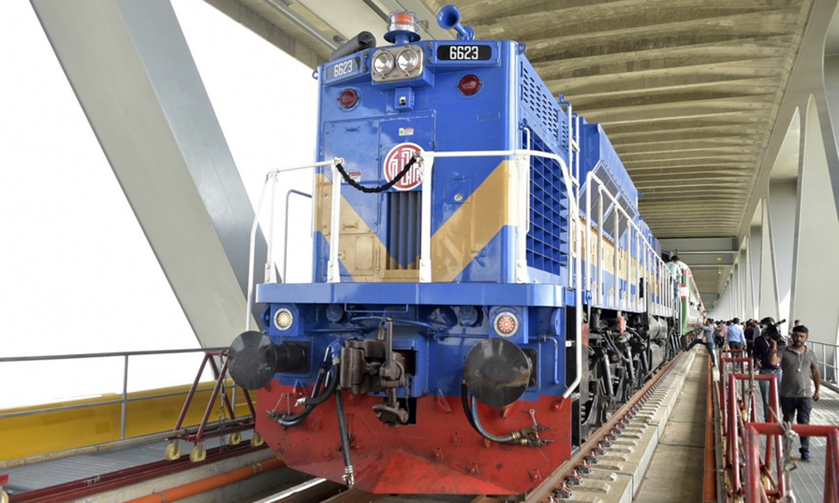 A passenger train embarks on a trip on test run via Bangladesh's largest Padma Bridge from a station in Dhaka, Bangladesh on Sept. 7, 2023. (Xinhua)