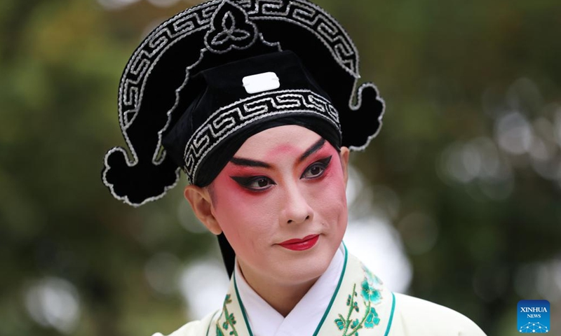Kunqu Opera actor Shi Xiaming is seen during a flash mob performance near the Eiffel Tower in Paris, France, Sept. 13, 2023. Artists from east China's Jiangsu Province presented the charm of Kunqu Opera through a series of flash mob performances near the iconic landmarks in Paris. (Photo: Xinhua)