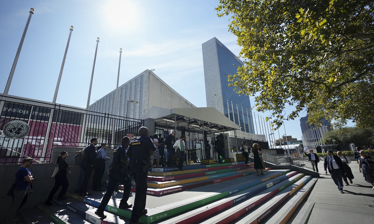 Participants arrive at the headquarters of the United Nations in New York on September 17, 2023 ahead of the General Assembly. This year's UNGA starts on Monday and will last through September 26 with a greater emphasis on the 
