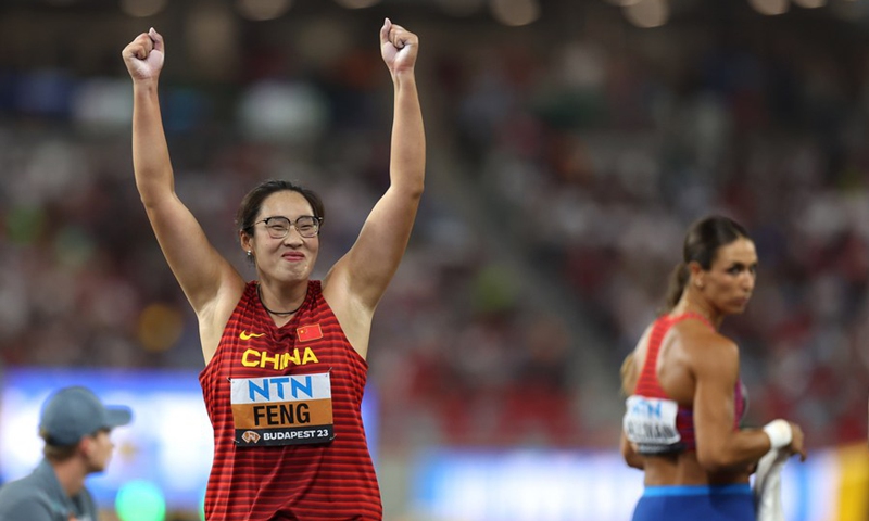 Feng Bin (L) celebrates after the women's discus throw final of the World Athletics Championships Budapest 2023 in Budapest, Hungary, Aug. 22, 2023. Photo: Xinhua