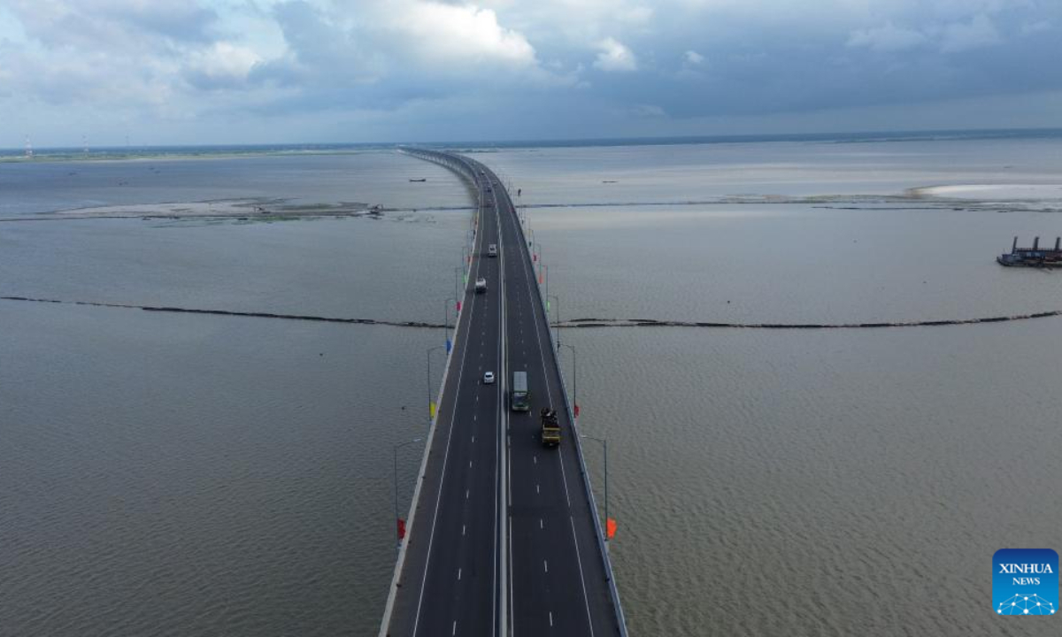 This photo taken on June 25, 2023 shows the Padma Bridge on the outskirts of Dhaka, Bangladesh. The bridge, which was undertaken by China Railway Major Bridge Engineering Group Co, Ltd. and opened to public in June 2022, ending the history of crossing the mighty Padma river between dozens of districts in southern Bangladesh and the capital of Dhaka only by ferries or boats. Photo:Xinhua