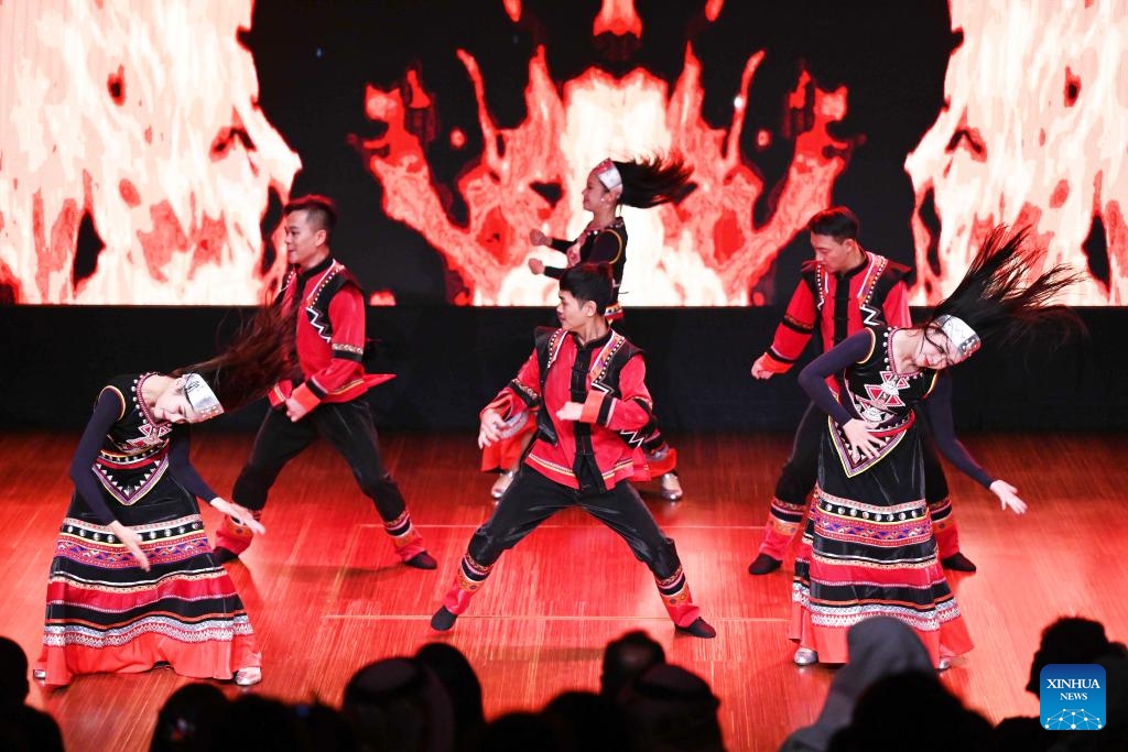 Chinese artists of an art troupe from Lincang City of southwest China's Yunnan Province perform in Capital Governorate, Kuwait, Sept. 19, 2023. The Kuwait Chinese Cultural Center held Tuesday its first show in Capital Governorate since its trial run. Chinese artists from Yunnan Province performed during the show, presenting the rich culture of ethnic minorities of Yunnan to the audience.(Photo: Xinhua)