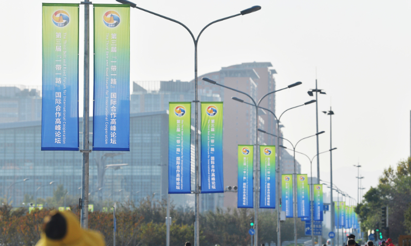 Theme flags of the third Belt and Road Forum for International Cooperation are seen along Datun Road in Beijing on October 16, 2023. Photo: VCG