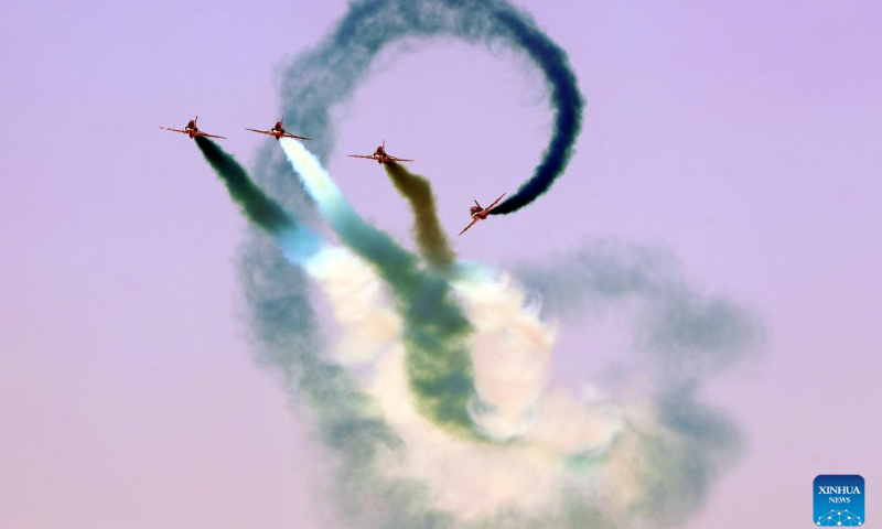 Aircraft perform aerobatics during the New Administrative Capital Air Show 2023 in the new administrative capital, east of Cairo, Egypt, Oct. 14, 2023. Aircraft from Egypt and Saudi Arabia jointly staged the New Administrative Capital Air Show 2023 in the new administrative capital on Saturday. (Xinhua/Ahmed Gomaa)