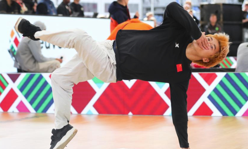 Zhang Xinjie of China competes during 2023 WDSF World Breaking Championship in Leuven, Belgium, Sept. 23, 2023. (Xinhua/Zheng Huansong)