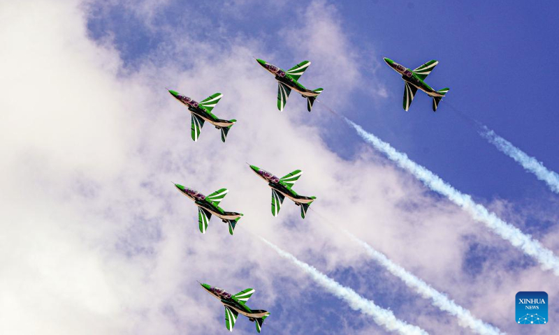 Aircraft perform aerobatics during the New Administrative Capital Air Show 2023 in the new administrative capital, east of Cairo, Egypt, Oct. 14, 2023. Aircraft from Egypt and Saudi Arabia jointly staged the New Administrative Capital Air Show 2023 in the new administrative capital on Saturday. (Xinhua/Ahmed Gomaa)