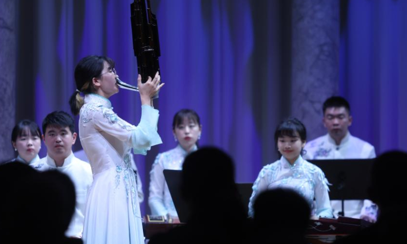 A member of China's Nanjing University's Traditional Instruments Orchestra plays Sheng during a concert of Chinese classical music in Ljubljana, Slovenia, on Oct. 2, 2023. (Photo by Zeljko Stevanic/Xinhua)