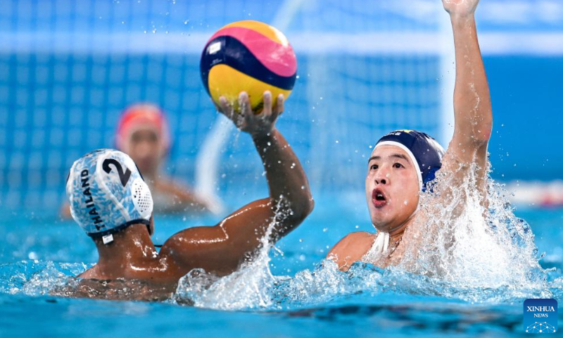 Chen Yimin (R) of China competes during the Men's Preliminary Round of Water Polo between Thailand and China at the 19th Asian Games in Hangzhou, east China's Zhejiang Province, Oct. 2, 2023. (Photo: Xinhua)