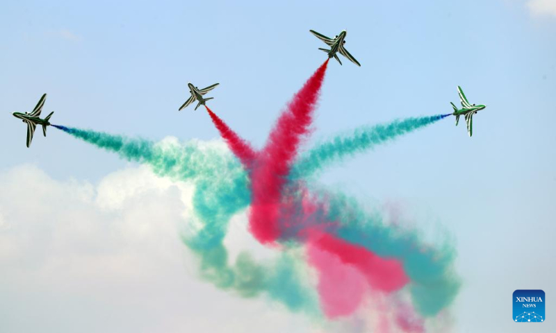 Aircraft perform aerobatics during the New Administrative Capital Air Show 2023 in the new administrative capital, east of Cairo, Egypt, Oct. 14, 2023. Aircraft from Egypt and Saudi Arabia jointly staged the New Administrative Capital Air Show 2023 in the new administrative capital on Saturday. (Xinhua/Ahmed Gomaa)