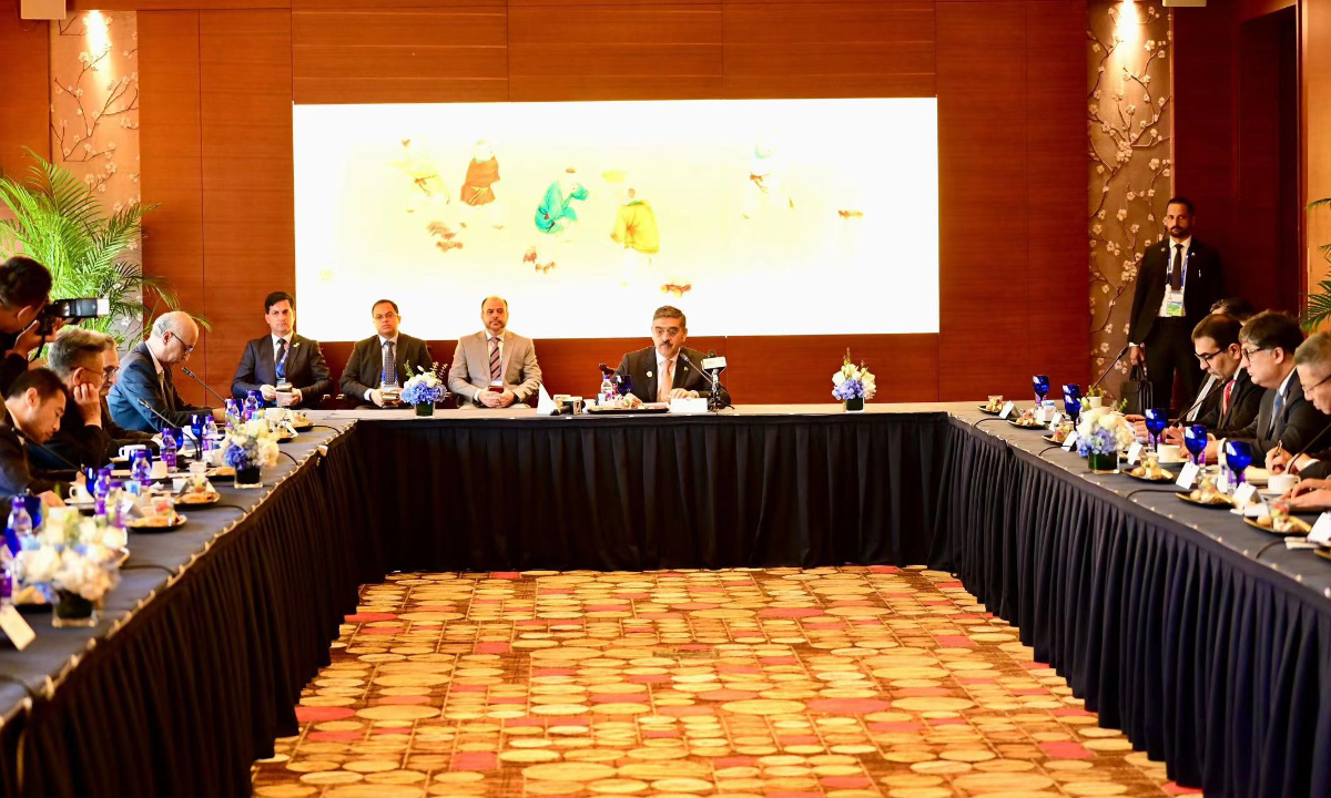 Pakistan’s caretaker Prime Minister Anwar-ul-Haq Kakar presides over a roundtable in Beijing on October 17, 2023. Photo: Courtesy of the Pakistani Embassy in Beijing