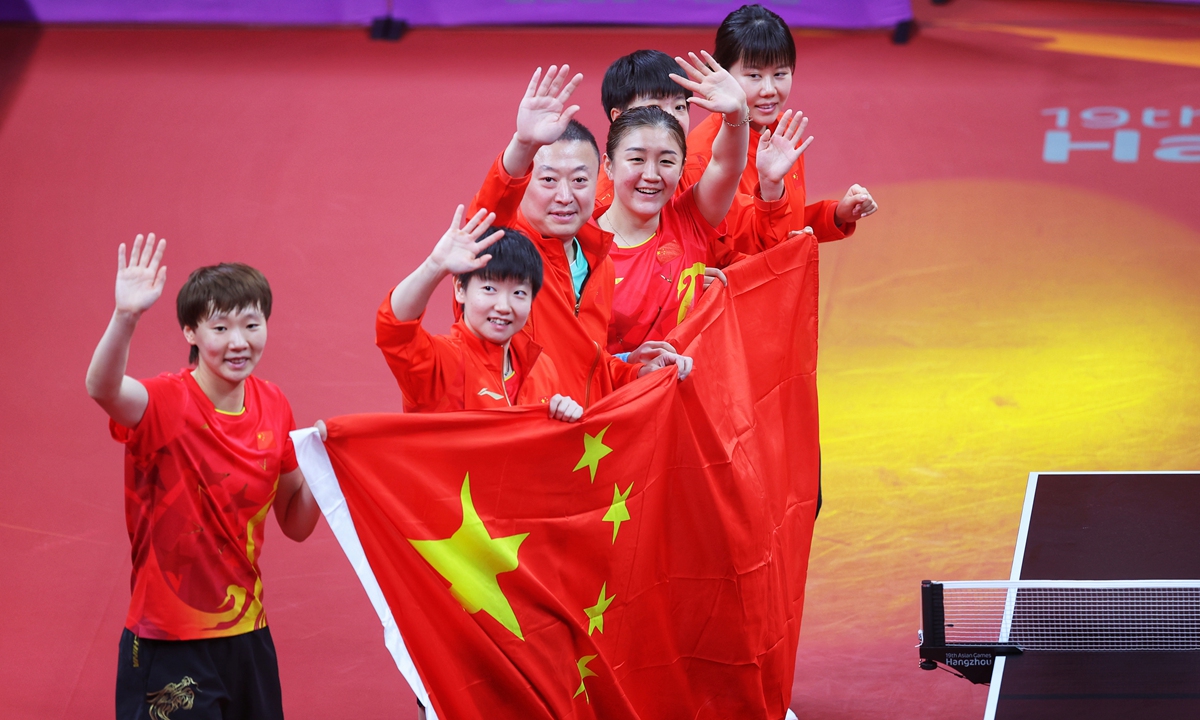 Chinese women's team players celebrate winning gold in the women's team event at the Hangzhou Asian Games on September 26, 2023.Photo: Cui Meng/Global Times