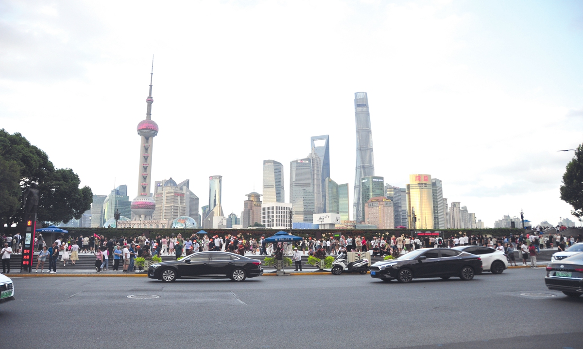 Bustling scenes on the Bund area in Shanghai Photo: VCG