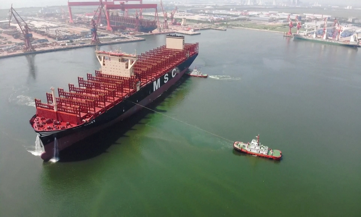 A shipyard under the China State Shipbuilding Corp delivers a large container ship from its base in North China's Tianjin Municipality on September 27, 2023. With a length of 366 meters and capable of carrying 16,520 standard containers, the ship is the largest built in northern China. Photo: VCG