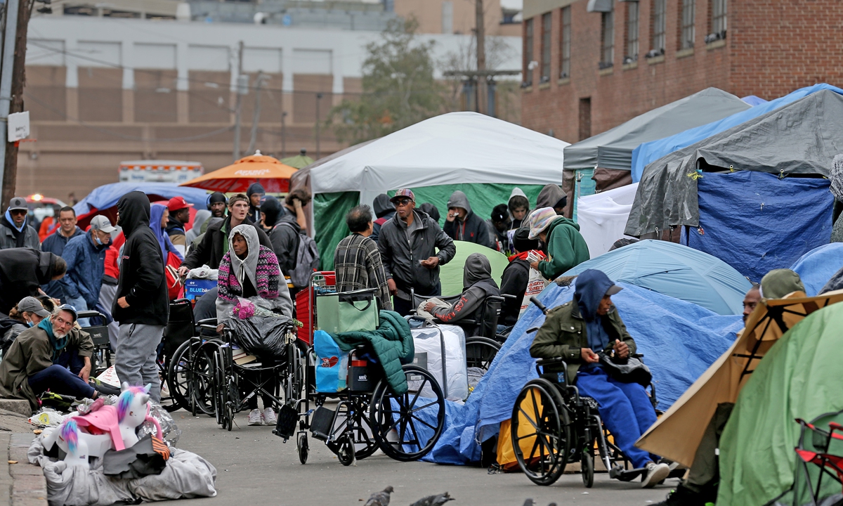 Tents fill Atkinson Street where drug users congregate in Boston, US, on September 26, 2023. Boston Public Health Commission security workers warned that it is not safe to walk through the street. According to provisional data from the US Centers for Disease Control and Prevention, more than 109,000 Americans died from drug overdoses in the 12-month period ending January 2023, a slight increase from the previous year.Photo: VCG