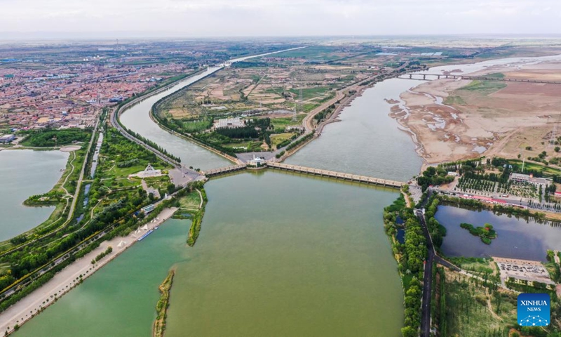 This aerial photo taken on June 6, 2023 shows the Sanshenggong Water Control Project which diverts water from the Yellow River in Bayannur, north China's Inner Mongolia Autonomous Region. The Hetao Irrigation Area, located in Bayannur, north China's Inner Mongolia Autonomous Region, has been diverting water from the Yellow River for irrigate since the Qin Dynasty (221 B.C.-206 B.C.). The current irrigation area stands at 11.54 million mu.(Photo: Xinhua)