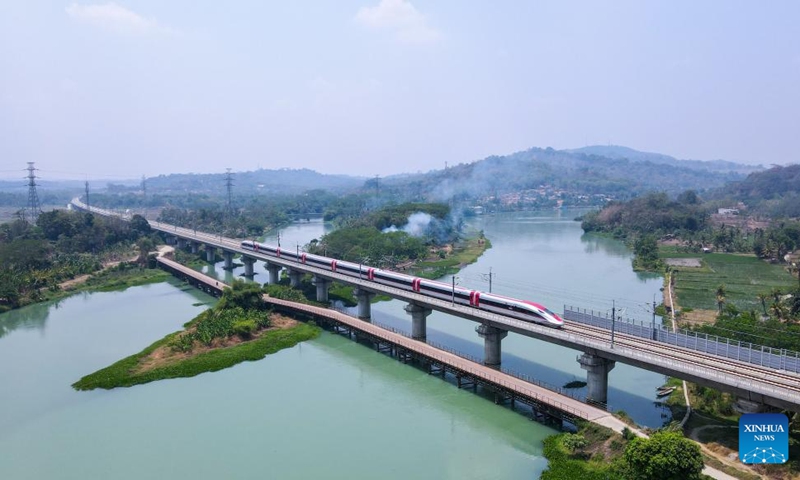 This aerial photo taken on Sept. 30, 2023 shows a high-speed electric multiple unit (EMU) train of the Jakarta-Bandung High-Speed Railway running in Purwakarta, Indonesia. Indonesian President Joko Widodo declared the official operation of the Jakarta-Bandung High-Speed Railway (HSR) at Halim Station in Jakarta Monday morning. Photo: Xinhua