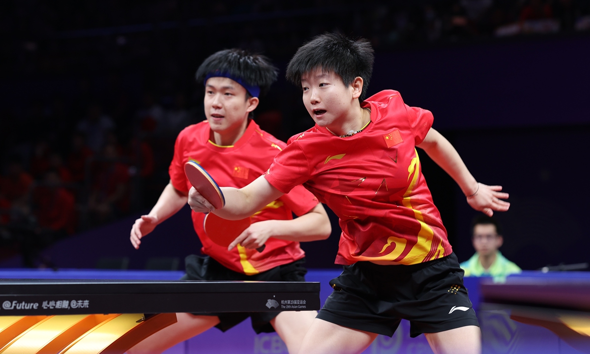 Chinese table tennis players Sun Yingsha (right) and Wang Chuqin (left) Photos: VCG