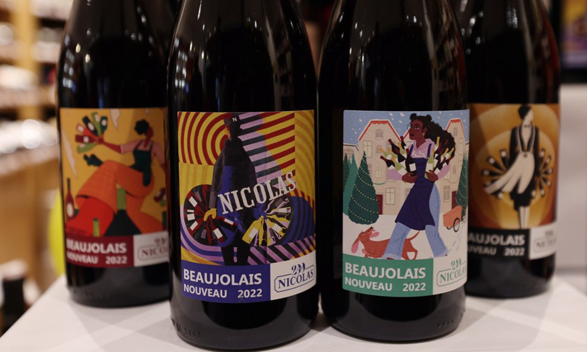  Bottles of new Beaujolais Nouveau wine are on sale at an alcohol boutique in Paris, France, Nov. 17, 2022. (Xinhua/Gao Jing)



