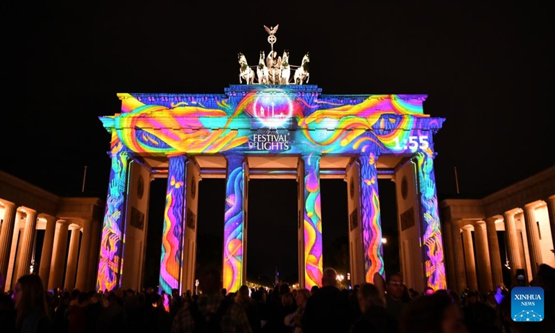 This photo taken on Oct. 6, 2023 shows the illuminated Brandenburg Gate during the 2023 Festival of Lights in Berlin, Germany. Berlin on Friday turned into a city of light art with the opening of the 2023 Festival of Lights, which will last until Oct. 15. (Xinhua/Ren Pengfei)