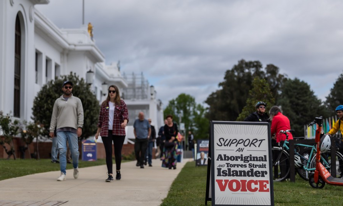 Voters walk out of a voting center in the Old Parliament House in Canberra, Australia, Oct. 14, 2023.(Photo by Chu Chen/Xinhua)



