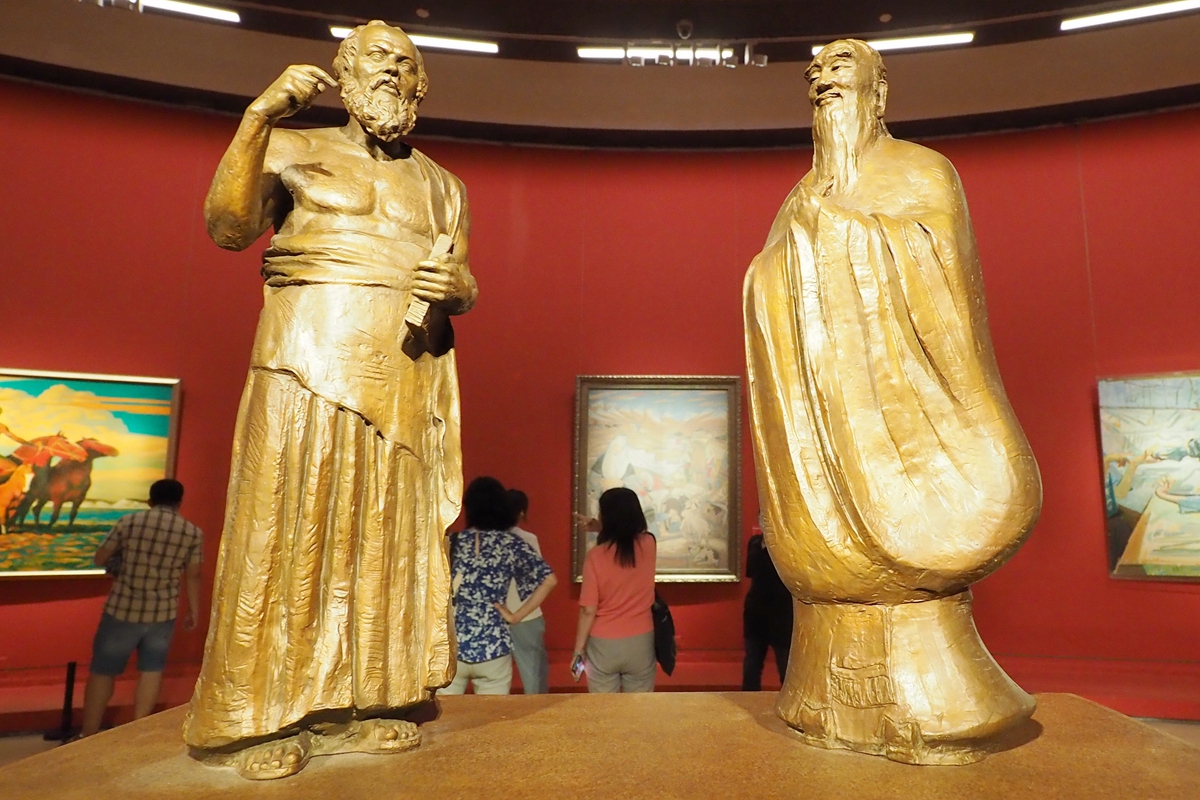 Divine Encounter - Dialogue between Confucius and Socrates by Wu Weishan Photo: IC 