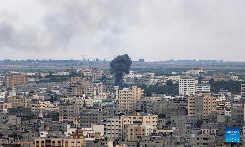 Smoke rises following an Israeli airstrike in Gaza City, Oct. 8, 2023. Israel's cabinet declared a state of war on Sunday after a massive surprise attack launched by Hamas has so far killed at least 700 in Israel while retaliatory Israeli airstrikes killed at least 413 in Gaza(Photo: Xinhua)