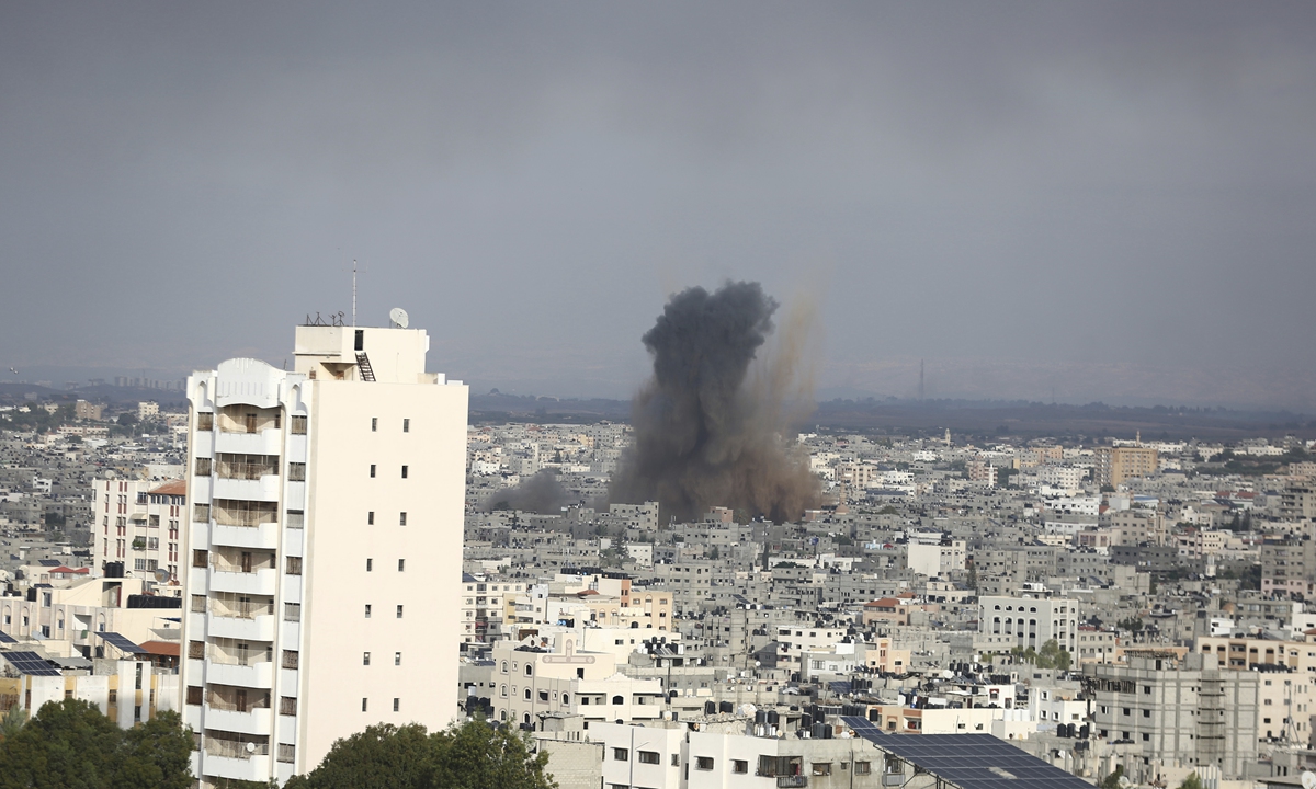 Smoke rises over Gaza City during Israeli airstrikes, which came soon after the militant group Hamas' rampage into Israel on October 7, 2023. According to army sources, several armed Palestinians have entered Israeli territory during the barrage of rocket attacks from the Gaza Strip. Photos: VCG