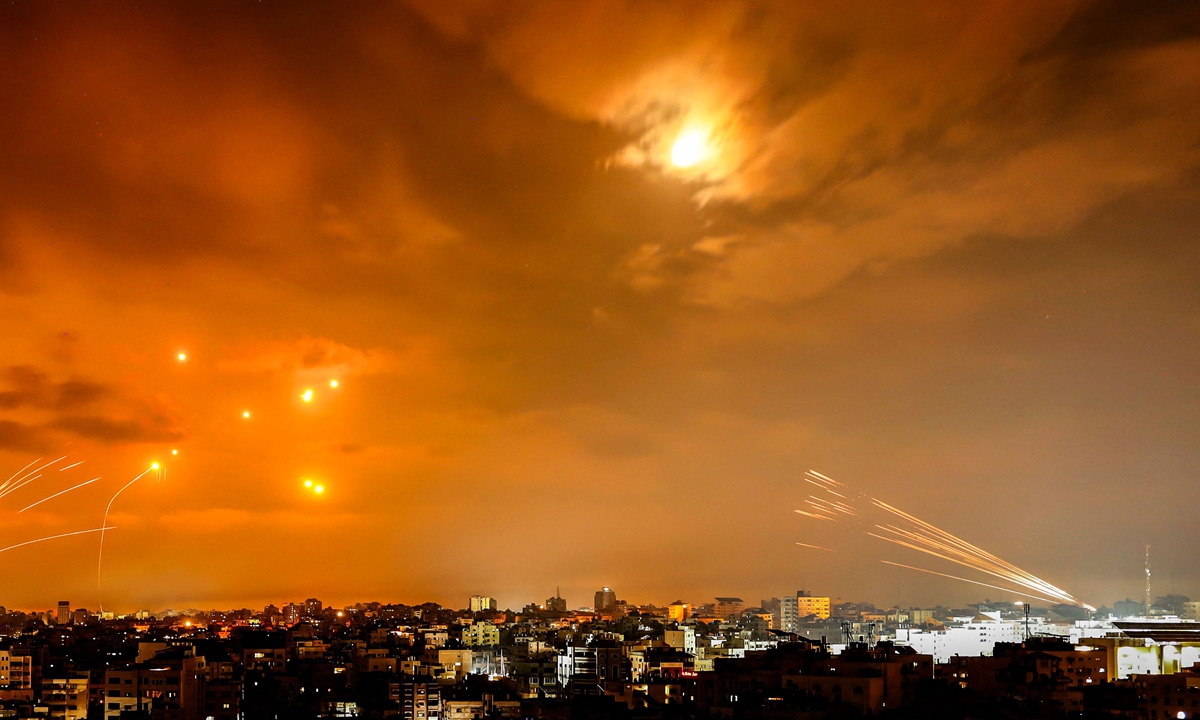 Rockets fired by Palestinian militants Hamas from the Gaza Strip are intercepted by the Israeli Iron Dome defence missile system in the early hours of October 8, 2023. Photo: VCG