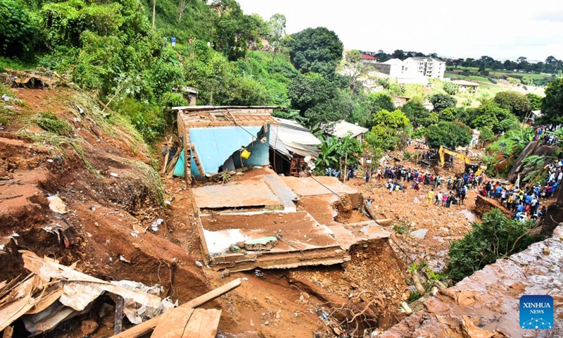 Photo taken on Oct. 9, 2023 shows the site of landslides in Yaounde, Cameroon. Rescuers pulled out three more bodies later Monday after landslides in Yaounde buried homes and buildings Sunday, bringing the death toll of the disaster to 30, officials said.(Photo: Xinhua)