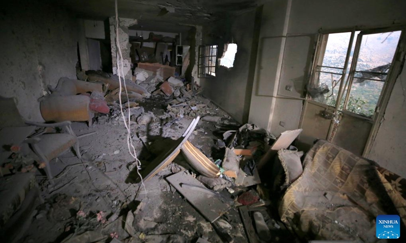 A house is seen damaged in Israeli artillery shelling, which led to the death of a Lebanese couple, on the outskirts of the town of Shebaa in southeast Lebanon, Oct. 14, 2023. A fighter with Hezbollah, a Lebanese military group, was killed in the Israeli attacks that targeted the Shebaa Farms on Saturday afternoon, a statement by the Shiite group reported.(Photo:Xinhua)