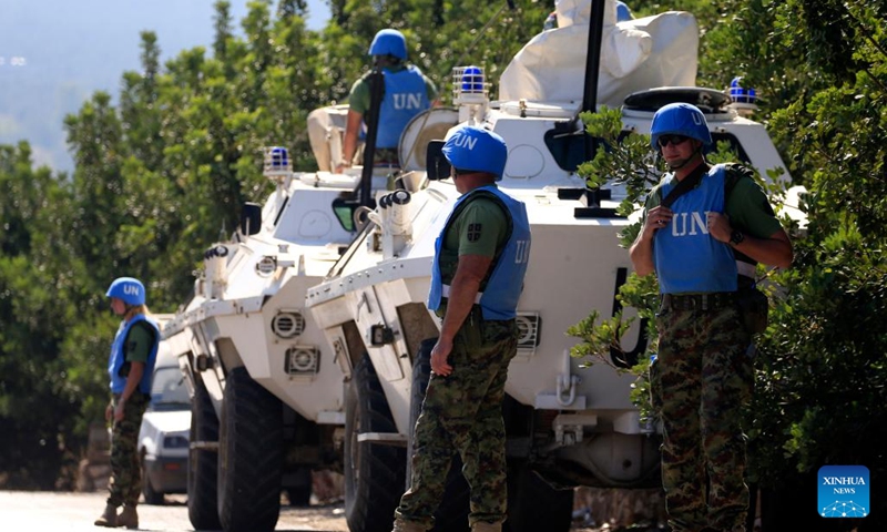 The United Nations Interim Force In Lebanon (UNIFIL) peacekeepers patrol on the Lebanese-Israeli border on Oct. 14, 2023. A fighter with Hezbollah, a Lebanese military group, was killed in the Israeli attacks that targeted the Shebaa Farms on Saturday afternoon, a statement by the Shiite group reported.(Photo:Xinhua)