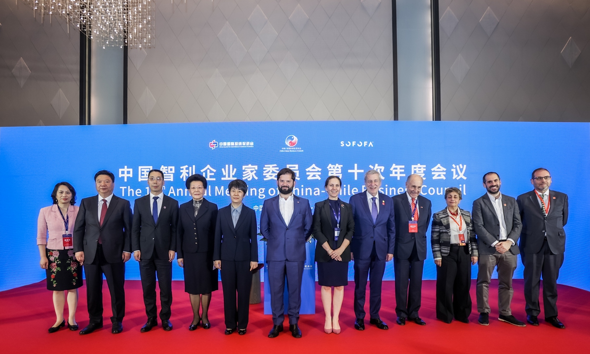 Chilean President Gabriel Boric (center), along with other members of the Chilean delegation, and Chinese government and industry representatives, pose for a group photo at the 10th Annual Meeting of the China-Chile Business Council in Beijing on October 16, 2023. Photo: Courtesy of China Council for International Investment Promotion