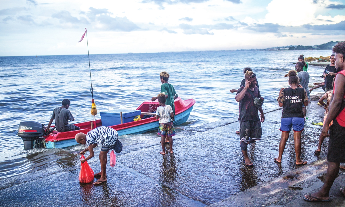 People gather at a beach of Honiara, the Solomon Islands, on August 21, 2023. Photo: Shan Jie/GT
