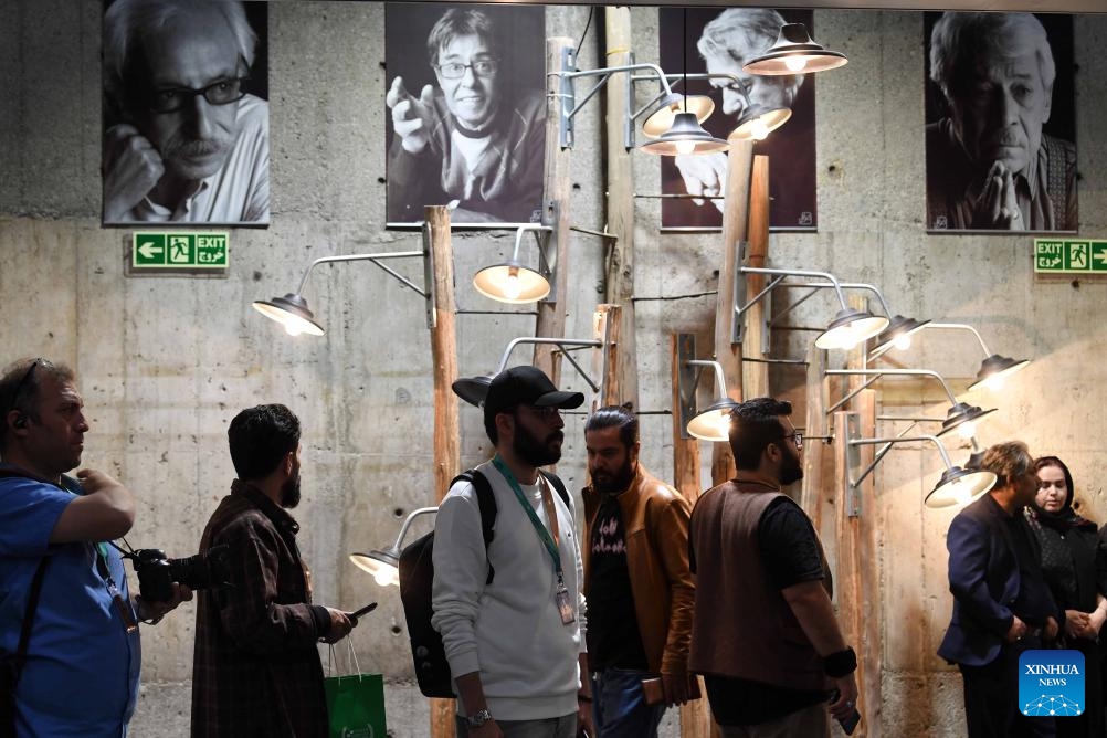 People are seen at the 40th Tehran International Short Film Festival in Tehran, Iran, on Oct. 19, 2023. The 40th Tehran International Short Film Festival opened in Iran's capital Tehran on Thursday, the official news agency IRNA reported.(Photo: Xinhua)