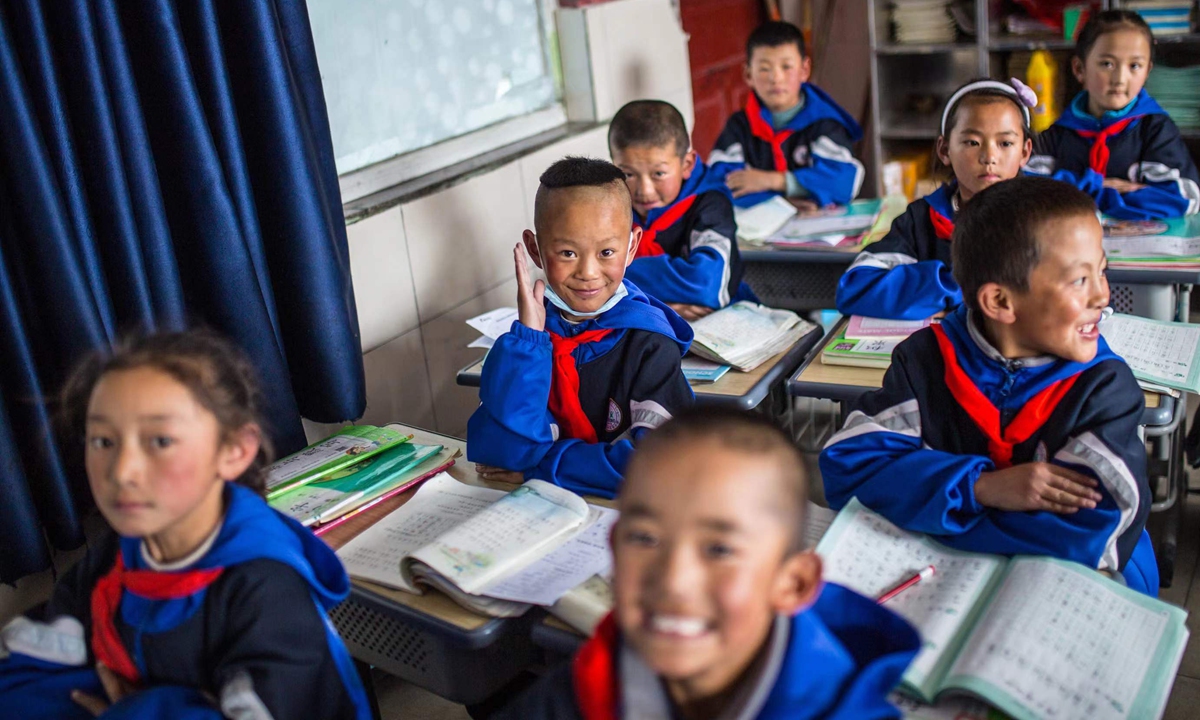 Students attend class at the Sinopec Primary School on October 13, 2023. Photo: Shan Jie/GT