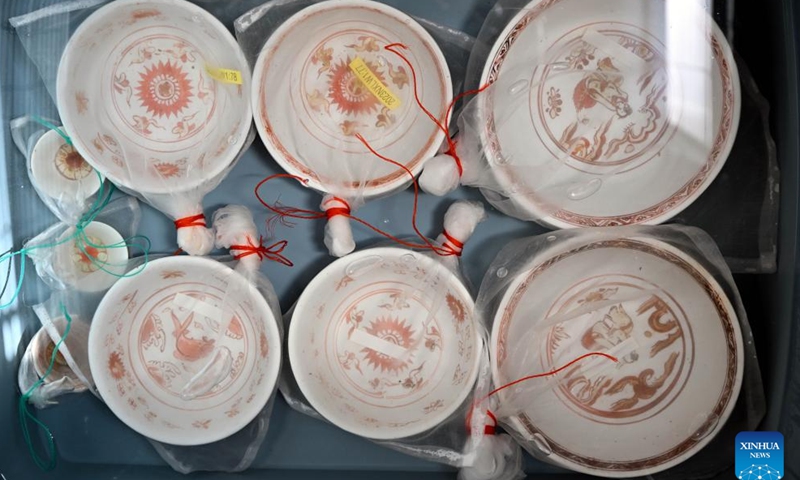 This photo taken on Oct. 10, 2023 shows cultural relics unearthed from ancient shipwrecks discovered in the South China Sea. (Photo: Xinhua)