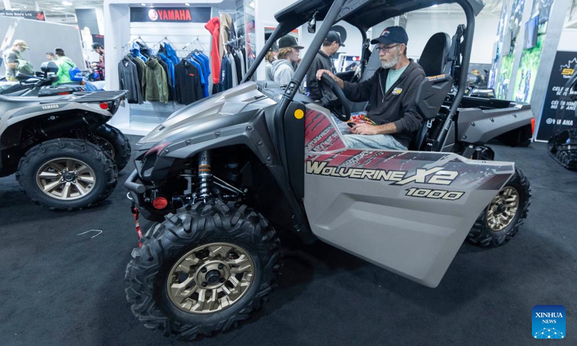 A man experiences a Yamaha all-terrain vehicle (ATV) during the 2023 Toronto International Snowmobile, ATV & Powersports Show in Mississauga, the Greater Toronto Area, Canada, on Oct. 21, 2023. Showcasing new snowmobile and ATV line-ups from major manufacturers around the world, the annual show is held here from Oct. 20 to 22. (Photo: Xinhua)