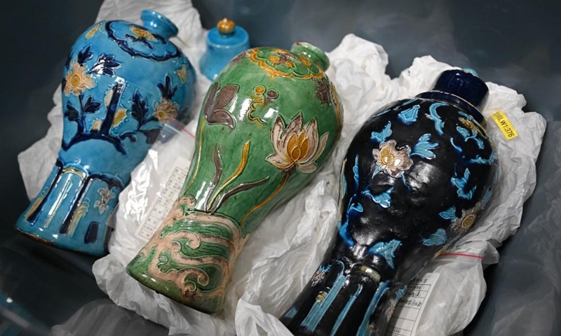 This photo taken on Oct. 10, 2023 shows cultural relics unearthed from ancient shipwrecks discovered in the South China Sea. (Photo: Xinhua)