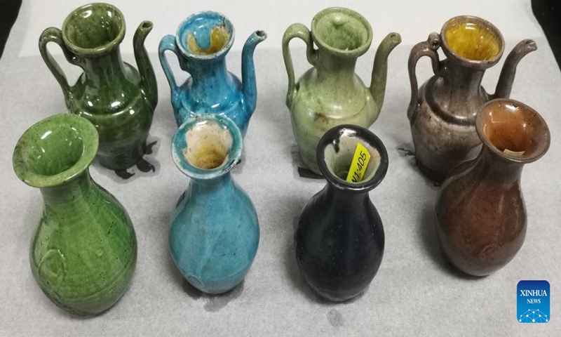 This undated photo shows cultural relics unearthed from ancient shipwrecks discovered in the South China Sea. Nearly 580 pieces (sets) of cultural relics have been unearthed from two ancient shipwrecks discovered in the South China Sea, according to the National Cultural Heritage Administration on Thursday. (Photo: Xinhua)