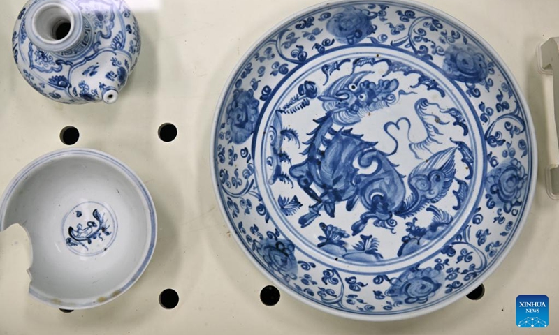This photo taken on Oct. 10, 2023 shows cultural relics unearthed from ancient shipwrecks discovered in the South China Sea. (Photo: Xinhua)