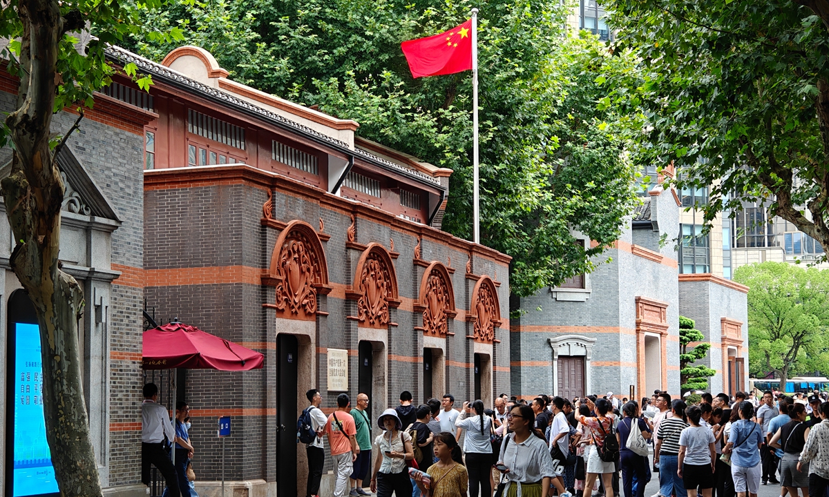 Tourists visit the Memorial Hall of the First National Congress of the Communist Party of China in Shanghai. Photo: VCG