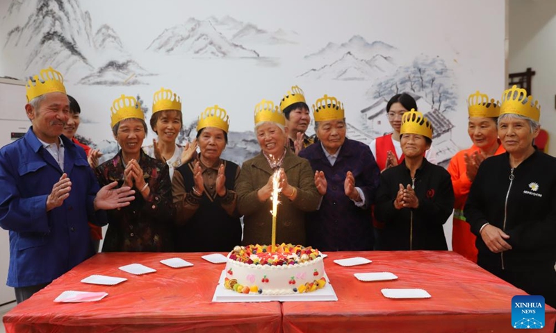 Volunteers hold a group birthday party for elders in Luqiao District, Taizhou, east China's Zhejiang Province, Oct. 22, 2023. The Chongyang Festival, also known as the Double Ninth Festival, is an annual festival to show respect and care for the elderly throughout China. The festival falls on the ninth day of the ninth Chinese lunar month, which is October 23 this year. (Photo: Xinhua)