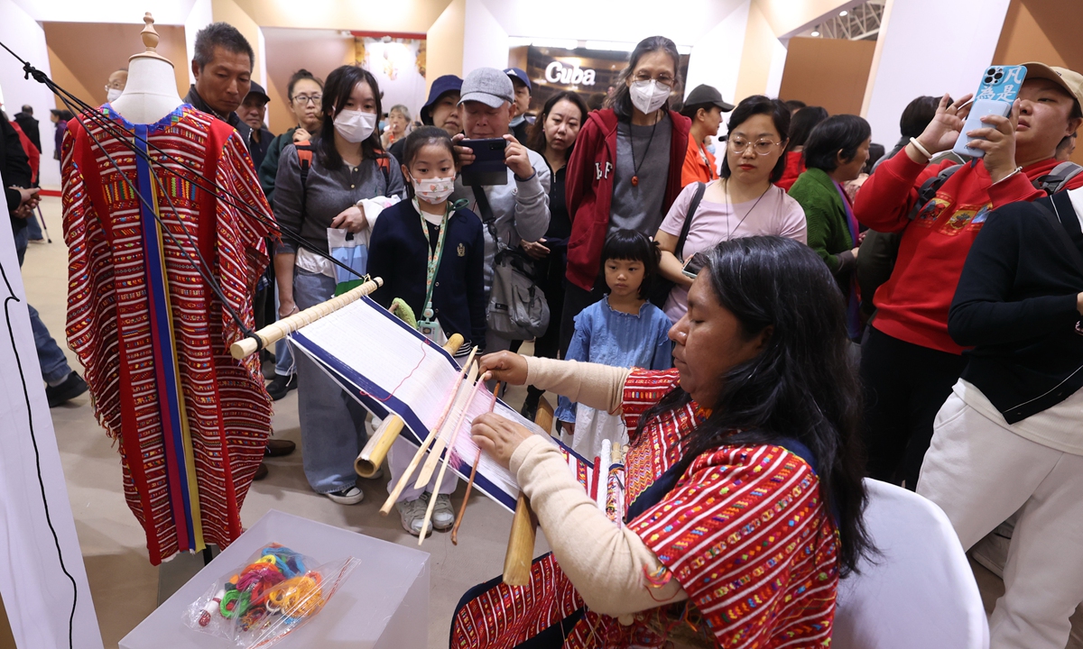 A Mexican intangible cultural heritage inheritor demonstrates weaving skills at the first Beijing International Week of Intangible Cultural Heritage on October 25, 2023 in Beijing. The event, held from Sunday to Wednesday, attracted nearly 1,000 delegates from home and abroad, who brought with them nearly 500 intangible cultural heritage projects and over 3,000 exhibits and artworks. Photo: VCG