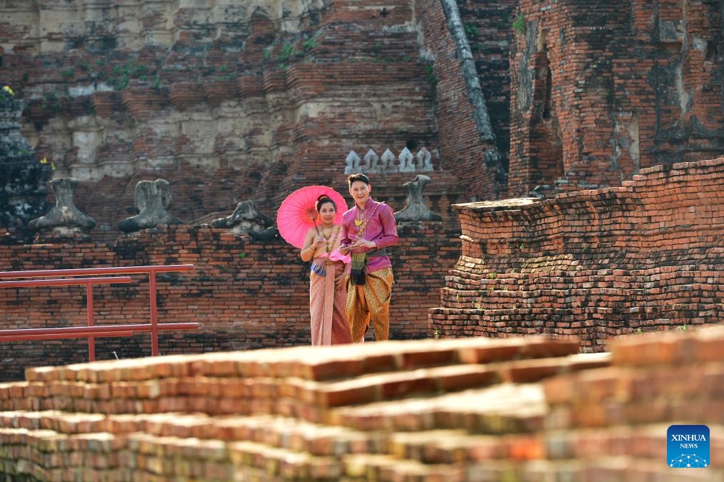 Tourists are seen at the Ayutthaya Historical Park in Ayutthaya, Thailand, Oct. 22, 2023. Located in central Thailand, Ayutthaya was founded around 1350 and is the famous ancient capital of Thailand. In 1991, the ancient city of Ayutthaya was listed as a UNESCO World Heritage Site with a protected area of 289 hectares.(Photo: Xinhua)
