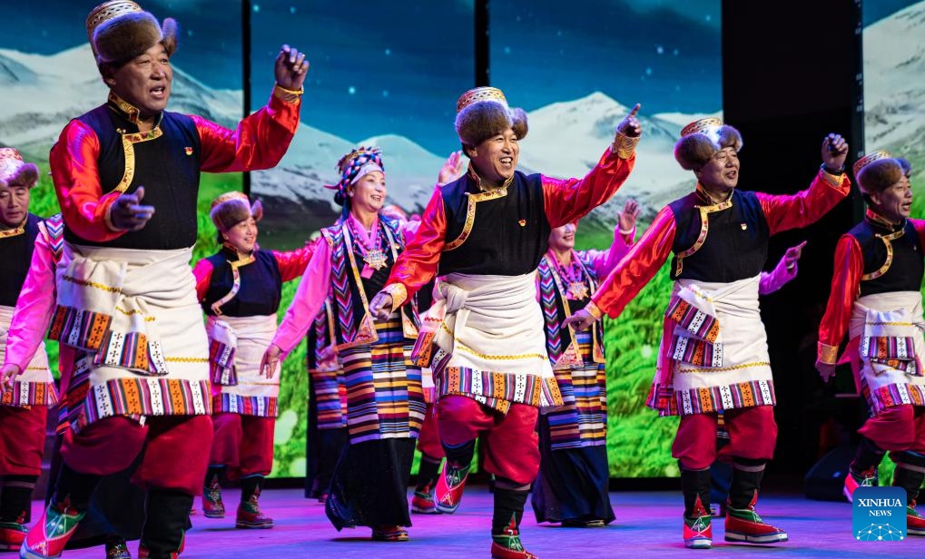 Senior artists perform during an art show celebrating the Chongyang Festival in Lhasa, southwest China's Tibet Autonomous Region, Oct. 23, 2023. An art show, presented by senior artists from various elderly troupes in Tibet, was held in Lhasa on Monday to celebrate the Chongyang Festival or the Double Ninth Festival for the elders.(Photo: Xinhua)