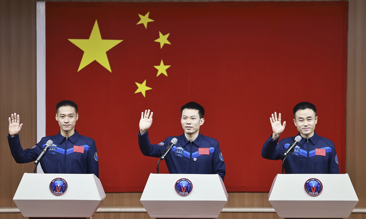 Chinese astronauts Tang Hongbo (center), Tang Shengjie (right) and Jiang Xinlin, the crew for the upcoming Shenzhou-17 spaceflight mission, meet the press at Jiuquan Satellite Launch Center in northwest China on October 25, 2023. Photo: Xinhua