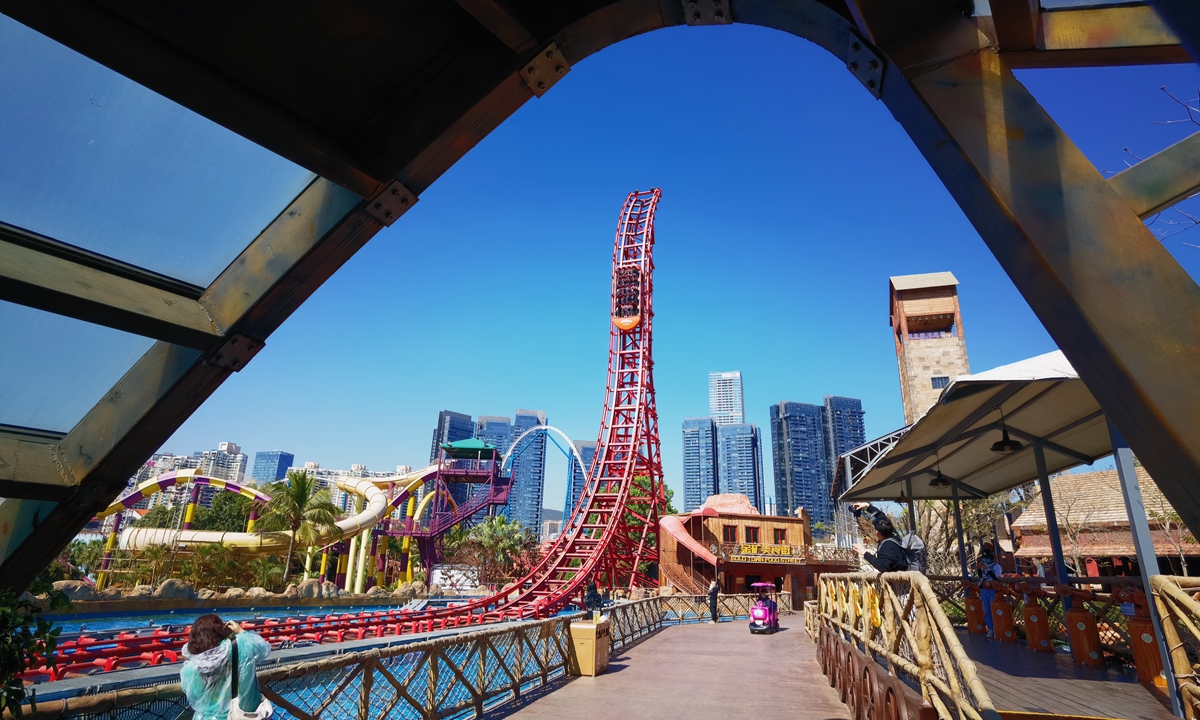 Visitors take roller coaster at Happy Valley theme park in the city of Shenzhen in South China’s Guangdong Province on March 8, 2023. Photo: from IC.