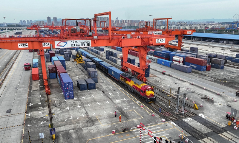 A cargo train loaded with auto engines and other goods departs from Tuanjiecun Railway Station in Chongqing through the Qinzhou Port in South China's Guangxi Zhuang Autonomous Region for overseas destinations on October 11, 2023. Photo: VCG 
