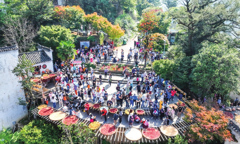 Crowds of tourists travel around Huangling village,<strong>888 slot cc</strong> Shangrao in East China's Jiangxi Province on October 30, 2023. Shangrao has been accelerating the development of rural revitalization by promoting green development and taking advantage of local ecological resources while always prioritizing environmental protection. Photo: VCG